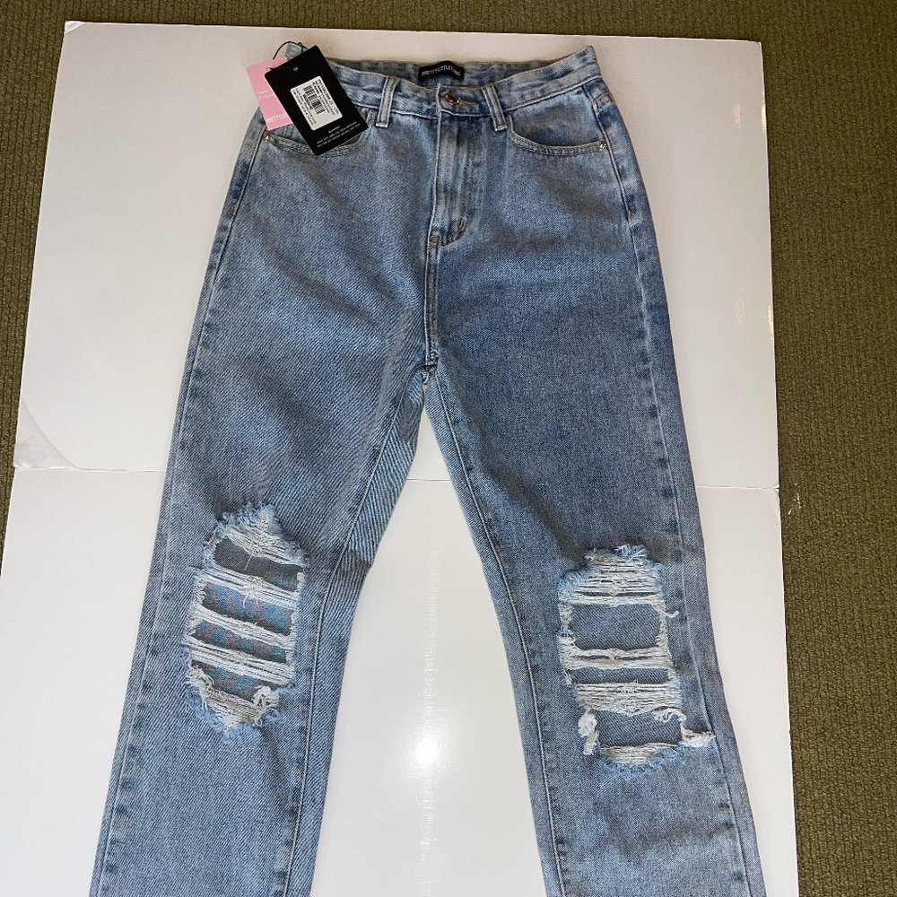 Light Wash Ripped Knee Long Leg Straight Jeans